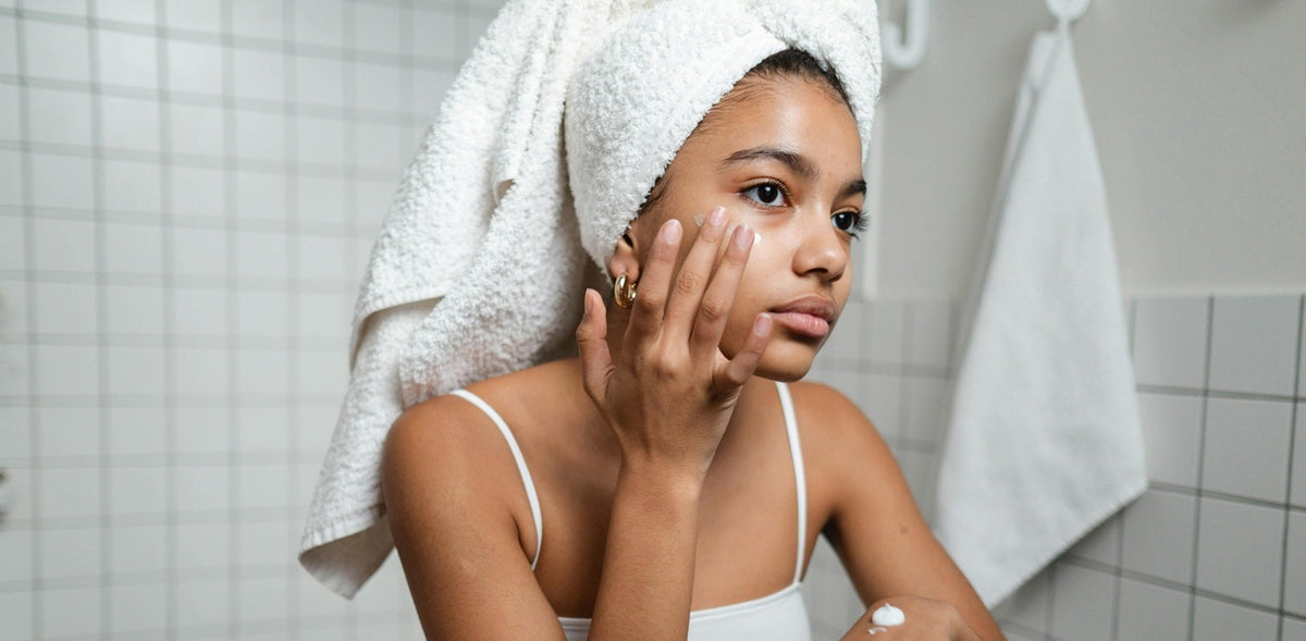 A woman is doing a skincare routine